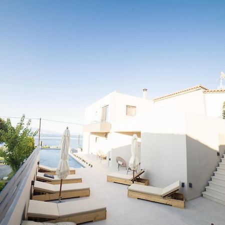 Theros Suites Dhiminio Exterior photo